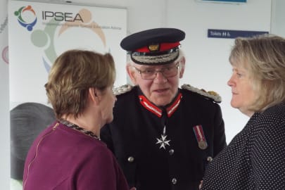 IPSEAs CEO accepting the Queens Award for Voluntary Service in 2015